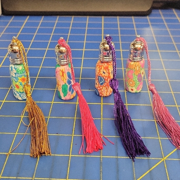 Bundle of 4 Colorful Perfume Essential Oil Bottles with Tassels 10 ml - Picture 1 of 3